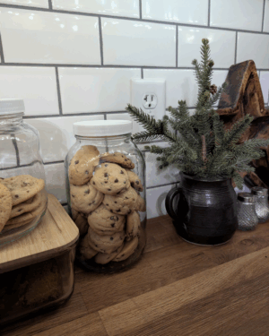 Chocolate Chip Shorties. Chocolate Chip Shortbread Cookies in a glass jar on a butcher block counter.